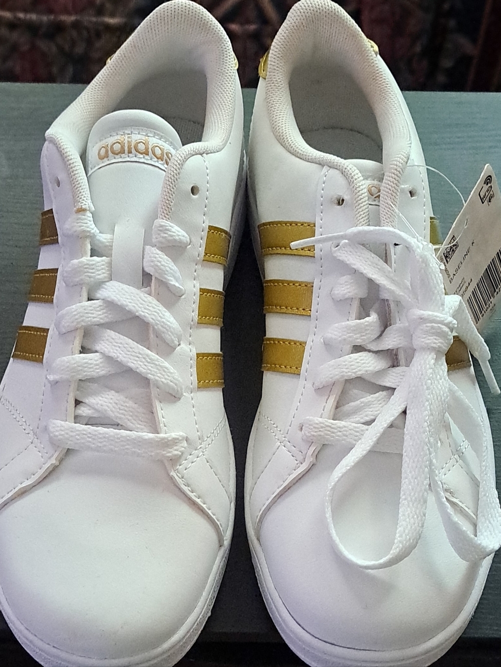 adidas White Sneakers with Gold Stripes - Women's